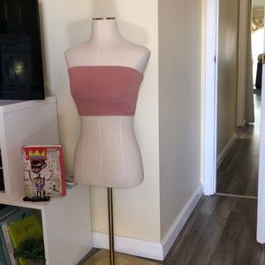 Pink suede tube top.